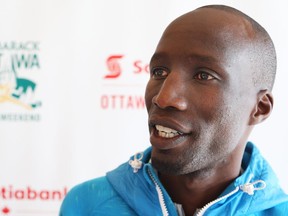 Wesley Korir is interviewed after a press conference about the Tamarack Ottawa Race Weekend.