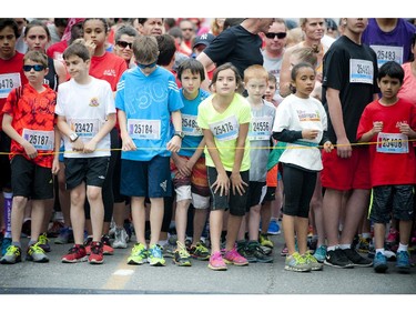 Young runners line up at the start line of the 2k race at Tamarack Ottawa Race Weekend Saturday May 23, 2015.