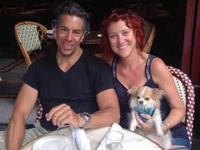 Stefan Dumas and Sonja Lishchynski pose with their long-haired chihuahua Montecristo in Philadelphia in an undated handout photo. Lishchynski is founder of Montecristo Travels, an Ottawa-based travel blog which provides tips on travelling with small dogs.