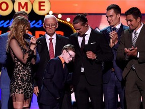 Erik Karlsson of the Ottawa Senators speaks to Jonathan Pitre during the 2015 NHL Awards at MGM Grand Garden Arena on June 24, 2015 in Las Vegas, Nevada.