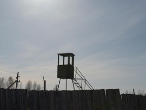 A watch tower stands in a museum commemorating victims of Soviet-era political repressions located in a former prison camp, some 110 kms (69 miles) northeast of the west Siberian city of Perm, Russia, Friday, March 6, 2015. Historians estimate that under Soviet dictator Josef Stalin, 700,000 people were executed during the peak of the purges in 1937-1938.