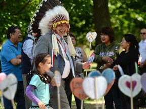 National Chief of the Assembly of First Nations Perry Bellegarde takes part in the planting of a heart garden during the closing ceremony of the Indian Residential Schools Truth and Reconciliation Commission, at Rideau Hall earlier in June.