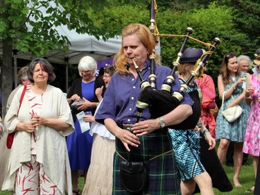 Bethany Bisaillion, from the Sons of Scotland Pipe Band, played "When Irish Eyes Are Smiling" for Irish Ambassador Ray Bassett at a garden party that he hosted at his official residence in Rockcliffe on Sunday, June 7, 2015, for Cornerstone Housing for Women.