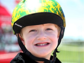 Max Sedmihradsky, 4, will ride with his father, Andrew, from Ottawa to Hamilton to raise money for research into Duchenne muscular dystrophy.