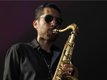 David Urquidi plays saxophone with the Funk band WAR.
