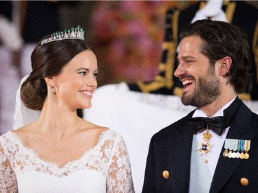 Prince Carl Philip of Sweden is seen with his new wife Princess Sofia of Sweden after their marriage ceremony on June 13, 2015 in Stockholm, Sweden.