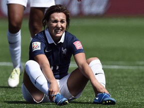 French midfielder Claire Lavogez reacts after a goal during a 2-0 loss to Colombia in Moncton on June 13, 2015. France, the third-ranked women's soccer nation in the world, is determined to turn things around against Mexico in Ottawa.