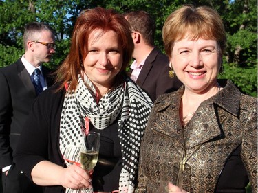 From left, Deneen Perrin, director of public relations at the Fairmont Chåteau Laurier, with Ontario Superior Court Justice Julianne Parfett at a reception held at the Austrian ambassador's residence in Rockcliffe on Tuesday, June 2, 2015.