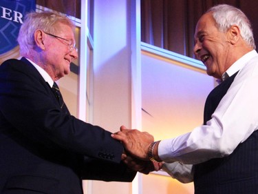 From left, Dr. Wilbert Keon, founder of the University of Ottawa Heart Institute, with his very grateful former patient, Peter Foustanellas, on stage together for the 30th Annual Gold Plate Dinner, held at the Hellenic Meeting and Reception Centre on Tuesday, June 9, 2015.