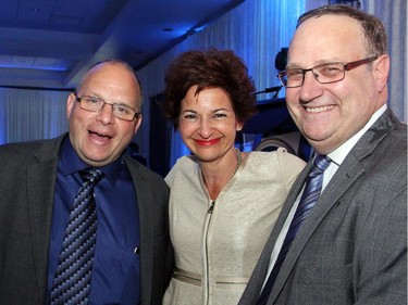 From left, Hellenic Community Council treasurer Jim Sourges and Kathy and Dean Karakasis at the 30th Annual Gold Plate Dinner held at the Hellenic Meeting and Reception Centre on Tuesday, June 9, 2015.