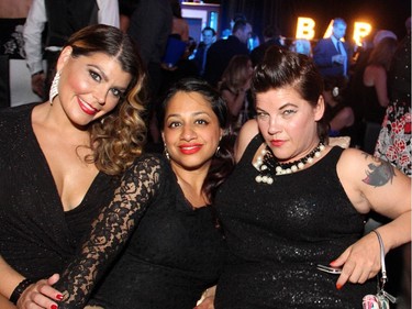 From left, Jessica Sinclair with Darpan Ahluwalia and Suzanne Quintal, looking very femme fatale at the film noir-inspired Bash Noir gala for the Snowsuit Fund, held Saturday, June 20, 2015, at Lansdowne Park's Horticulture Building.