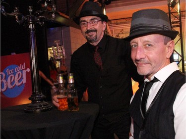 From left, Luc Parisien and Christopher Johnson were among the hundreds of attendees of the film noir-inspired Bash Noir party, held at Lansdowne Park's Horticulture Building on Saturday, June 20, 2015.