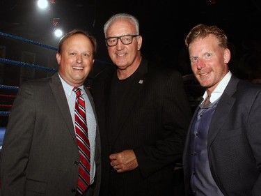 From left, Ringside for Youth XXI volunteer committee member Tony Rhodes with the event's youth ambassador, Gerry Cooney, and sponsor and former Ottawa Senators captain Daniel Alfredsson at the benefit for the Boys and Girls Club of Ottawa, held at the Shaw Centre on Thursday, June 11, 2015.