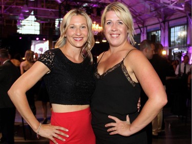 From left, Stacey Price, owner of Marry Me Productions and The White Dress, with Full Bloom florist Erin Carmichael at Lansdowne Park's Horticulture Building on Saturday, June 20, 2015, for the film noir-inspired Bash Noir benefit, where upscale black and red attire was encouraged.