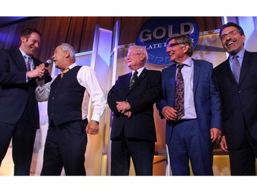 From left, "Stuntman Stu" Schwartz takes some ribbing from Peter Foustanellas, seen on stage with Dr. Wilbert Keon, Steve Ramphos and Jim Reklitis at the 30th Annual Gold Plate Dinner held at the Hellenic Meeting and Reception Centre on Tuesday, June 9, 2015.