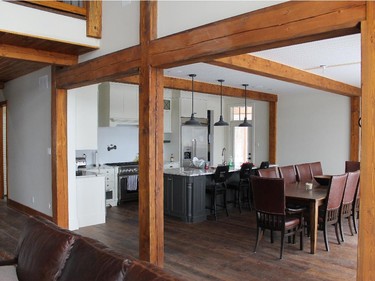 Custom builder EkoBuilt offers passive home kits that have interiors of exposed timber post-and-beam construction.