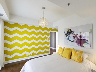 Hits of bright yellow liven the Lilac, especially in the master bedroom’s chevron wall.