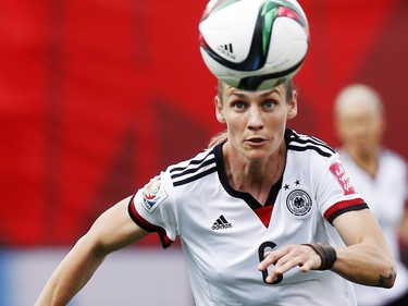 Germany's Simone Laudehr keeps her eye on the ball while playing Cote d'Ivoire' during the first half of their first match of the FIFA Women's World Cup at TD Place in Ottawa Saturday June 07, 2014.