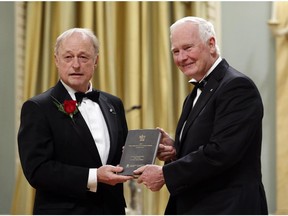 Daniel Poliquin is presented the Governor General's Literary Award for translation by Governor General David Johnston this past Nov. 26.