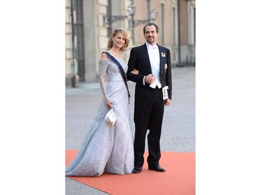 Greece's Prince Nikolaos, right, and Princess Tatiana arrive for the wedding of Prince Carl Philip and Sofia Hellqvis, , in Stockholm, Sweden, Saturday, June 13, 2015.  The only son of King Carl XVI Gustaf and Queen Silvia has married his Swedish fiancee in a lavish ceremony in Stockholm. Prince Carl Philip and the former reality starlet and model Sofia Hellqvist, 30, tied the knot Saturday at the Royal Palace chapel before five European queens, a Japanese princess and dozens of other blue-blooded guests.