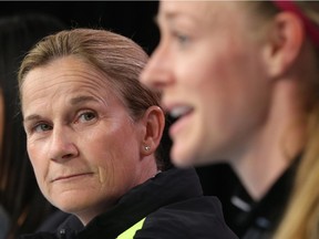 Head Coach Jill Ellis (L) looks on as player Becky Sauerbrunn (R) of FIFA USA Women's World Cup team speaks to media at TD Place in Ottawa on June 25, 2015. (Jana Chytilova / Ottawa Citizen)  ORG XMIT: 0625 FIFA USA WMN 06