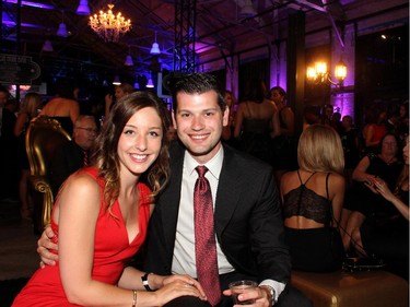 Jake Ruddy and Sophie Boucher, seen cosying up in one of the lounge areas, were among the hundreds of people to attend the Bash Noir party held Saturday, June 20, 2015, at Lansdowne Park's Horticulture Building.