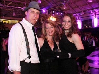 Jas Michalski with Chantal Smitheram and Carolin Vandenberg at the film-noir-inspired Bash Noir party held at Lansdowne Park's Horticulture Building on Saturday, June 20, 2015.