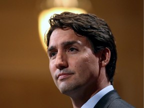 Liberal Leader Justin Trudeau takes questions during a news conference after delivering a speech in which the Liberal leader said after almost a decade of Stephen Harper as prime minister, Canada has less influence in Washington.