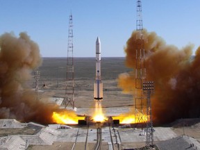 A Russian-built Proton rocket blasts off in 2014 from a launch pad in the Russian leased Kazakhstan's Baikonur cosmodrome.