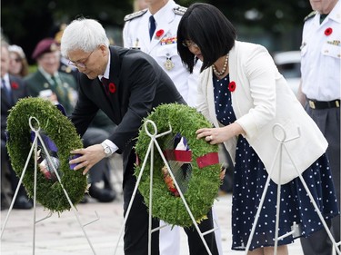 Korean ambassador Daeshik Jo and senator Yonah Martin lays the wreath at the 62nd anniversary of the Korean War Armistice at War Memorial in Ottawa on Sunday, June 21, 2015.