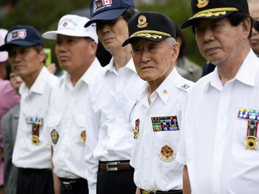 Korean veterans of the Korean war attends the 62nd anniversary of the Korean War Armistice at Monument to Canadian Fallen in Ottawa on Sunday, June 21, 2015.