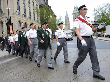 Korean war veterans march to War Memorial to begin the 62nd anniversary of the Korean War Armistice on Sunday, June 21, 2015.