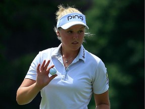 Brooke Henderson said in a Twitter message that she is feeling 'soreness' but was not seriously hurt.