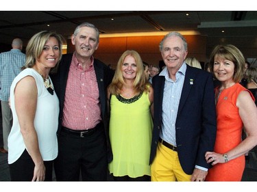 Lynda Kurylowicz and Stan Kurylowicz with Marci Groper and Graham Macmillan, chair of the Boys and Girls Club of Ottawa board, and his wife, Katie, at Ringside for Youth XXI held at the Shaw Centre on Thursday, June 11, 2015.