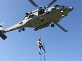 Marines with 3rd Marine Special Operations Battalion, U.S. Marine Corps Forces, Special Operations Command, conduct predeployment training in Savannah, Ga., May 23. During the training the Marines conducted helocasting drills.