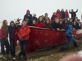 Members of the Ottawa Children's Choir chamber choir visit an abandoned Hudson Bay Post at Apex, outside Iqaluit, Nunavut, in May 2015 during Part 1 of the exchange.