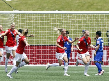Norway's Isabell Herlovsen (9) celebrates her first of two goals in the first half against Thailand during the first half of their first match of the FIFA Women's World Cup at TD Place in Ottawa Sunday June 07, 2015.