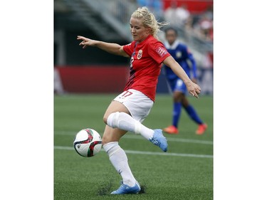 Norway's Lene Mykjaland (17) kicks the ball while playing Thailand during the second half of their first match of the FIFA Women's World Cup at TD Place in Ottawa Saturday June 07, 2014. Norway won 4-0.