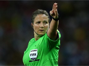 Carol Anne Chenard signals during a match  Britain and Brazil during the London 2012 Olympic Games.