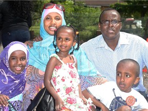 The Sougueh family: Youssouf, his wife, Amina Mohamed, and children Issir, 8, Aicha, 4, and Souber, 6.