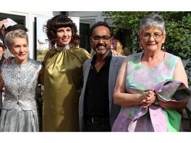 Ottawa couturier Frank Sukhoo, seen with volunteer models Kathleen Ethier (left), Jill Zmud, and Amy Russell, at the annual Sukhoo Sukhoo fashion show that took place at the Irish ambassador's official residence in Rockcliffe on Sunday, June 7, 2015, in support of Cornerstone Housing for Women.