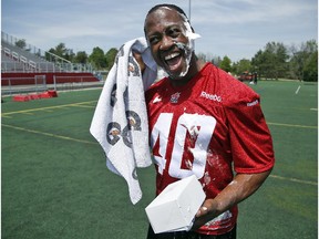 Ottawa Redblacks' QB Henry Burris has a laugh after receiving a birthday cupcake and then a face full of shaving cream to mark his 40th birthday.