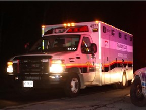 Paramedic ambulance near the scene of a fire at 1934 Stagecoach Rd. south of Greely (Ottawa), Thursday, October 9, 2014. Reports from the scene indicate a large explosion was followed by a ball of fire. Several buildings including a house were destroyed. No injuries reported. Mike Carroccetto / Ottawa Citizen