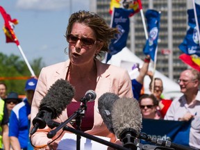 PIPSC president Debi Daviau speaks at a rally against constraints placed on the scientific community by the Canadian government at Tunney's Pasture on May 19, 2015.