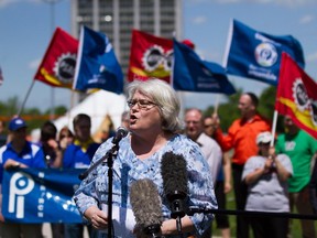 PSAC president Robyn Benson speaks at a rally in Ottawa.
