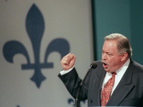 Quebec Premier Jacques Parizeau gestures during his speech to Yes supporters after losing the referendum in Montreal on Oct. 30, 1995.