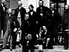 Several of the Fathers of Confederation are shown at the Charlottetown Conference in September 1864, where they had gathered to consider the union of the British North American Colonies. Sir John A. Macdonald, seated, and George-Etienne Cartier are in the foreground.