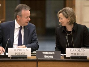 Governor of the Bank of Canada Stephen Poloz (left) and senior deputy governor Carolyn Wilkin arrive at a commons finance committee on Parliament Hill on Tuesday, April 28, 2015.