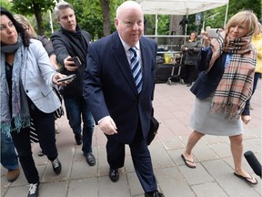 Suspended Senator Mike Duffy heads to court in Ottawa on Monday, June 1, 2015. Duffy faces 31 charges, including fraud, breach of trust and bribery.