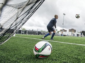 Team Norway goalkeeper, SILJE VESTERBEKKMO watches a ball go into the net during practice at Algonquin College Sunday June 01, 2014 in preparation for their FIFA 2015 Women's World Cup opener against Thailand Sunday.